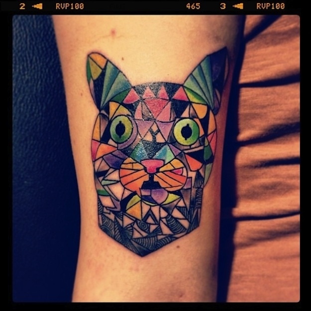 Colored Stained Glass Cat Tattoo On Left Bicep