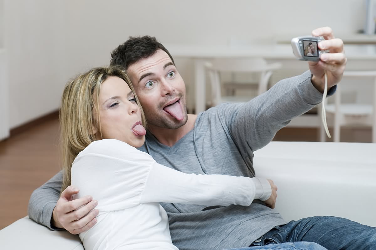 Couple Making Funny Face Taking Selfie