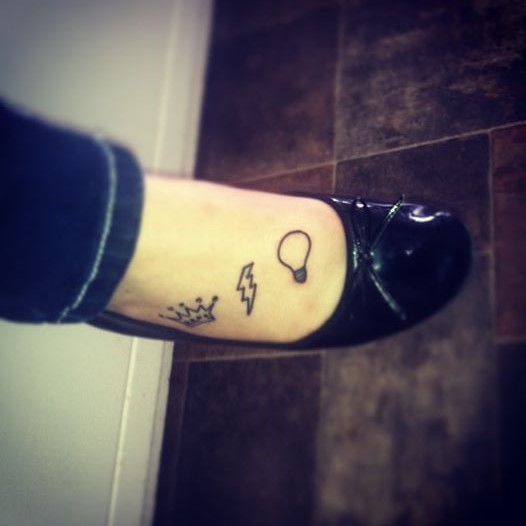 Crown And Bulb Tattoo On Right Foot For Girls