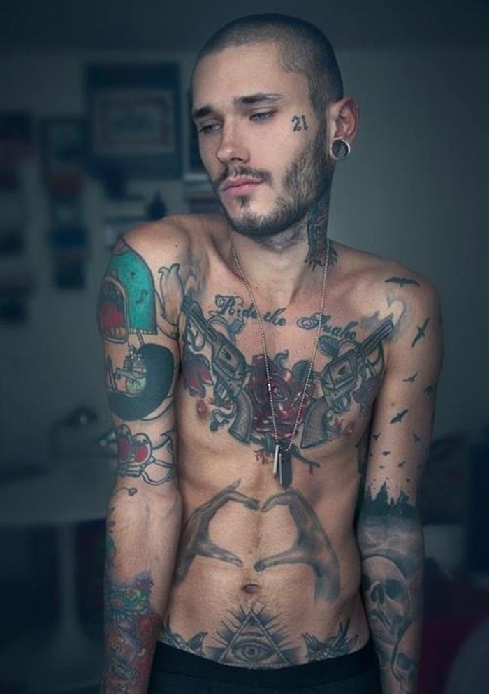 Dawid Auguscik With Guns Tattoo On Fully Body