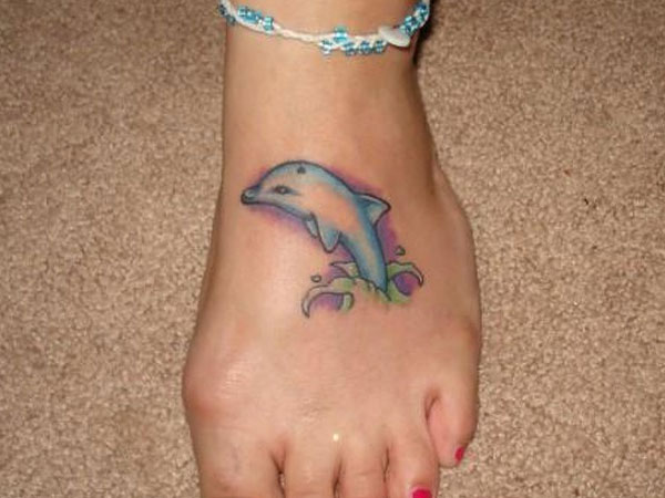 Dolphin Tattoo On Girl Foot