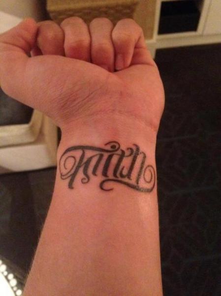 Faith And Trust Tattoo On Left Wrist