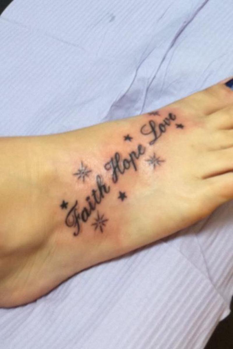 Faith Hope Love Lettering Tattoo On Foot