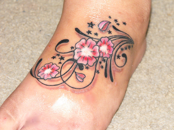 Fantastic Flowers Tattoo On Foot