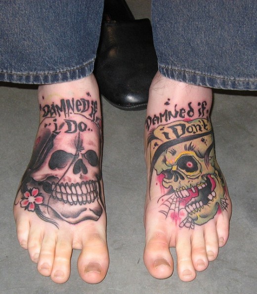 Fantastic Two Skull Tattoo On Feet
