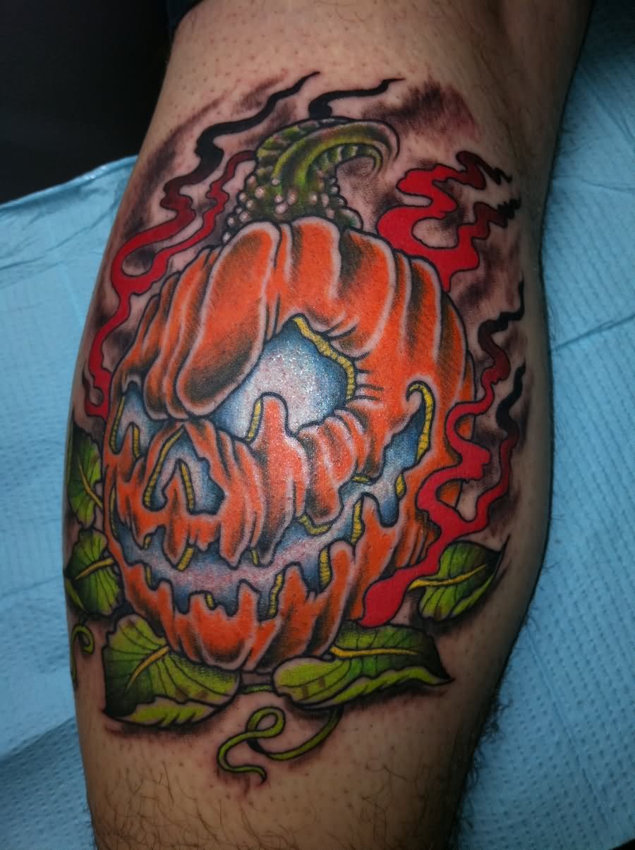 Flaming Pumpkin Tattoo On Back Leg