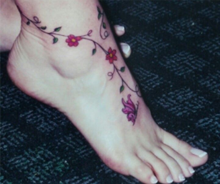 Flowers With Butterfly Tattoo On Foot