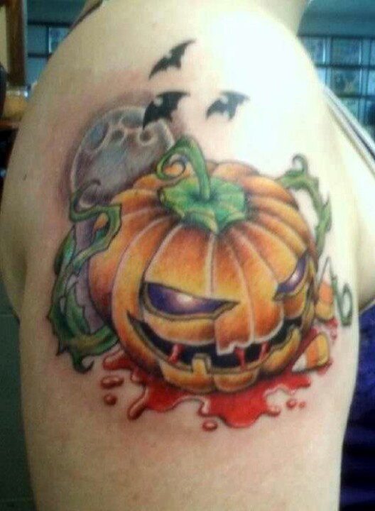 Flying Bats And Evil Pumpkin Tattoo On Right Shoulder