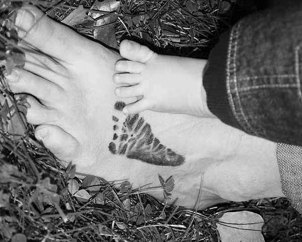 Foot Print Tattoo On Foot