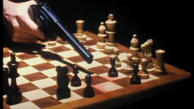 Funny Chess Playing With Gun