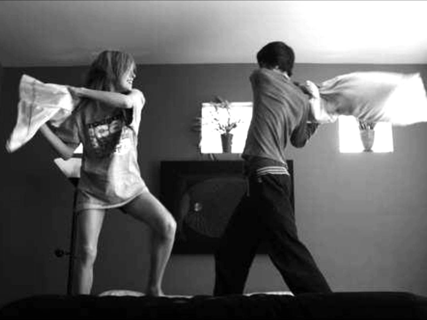 Funny Pillow Fighting Couple Picture