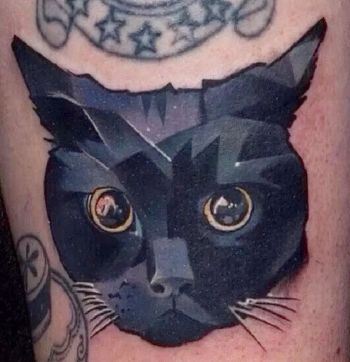Geometric Cat Head Tattoo On Leg