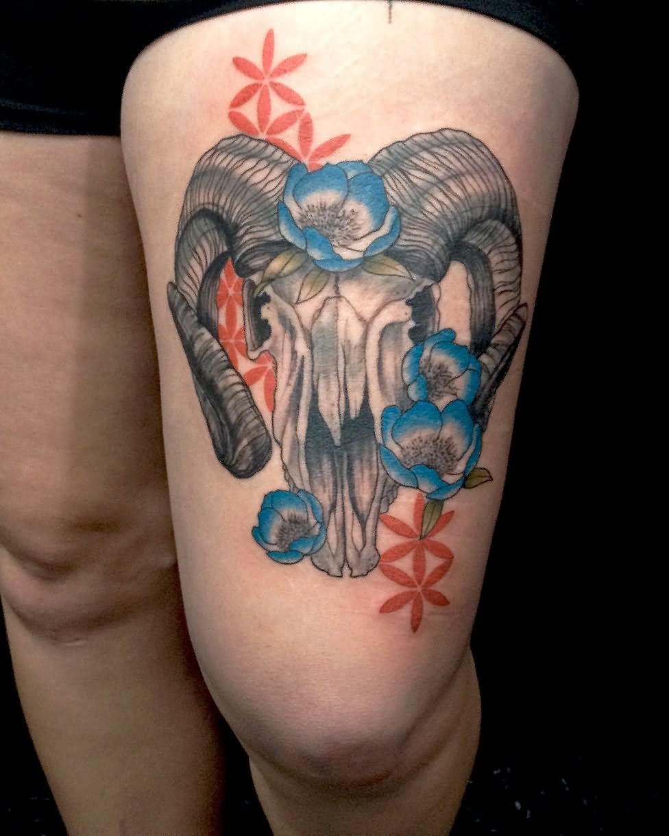 Goat Skull With Flowers Tattoo On Thigh