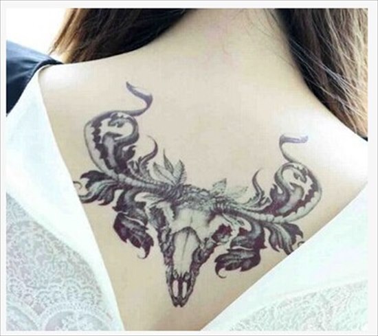 Goat Skull With Leaves Tattoo On Girl Upper Back