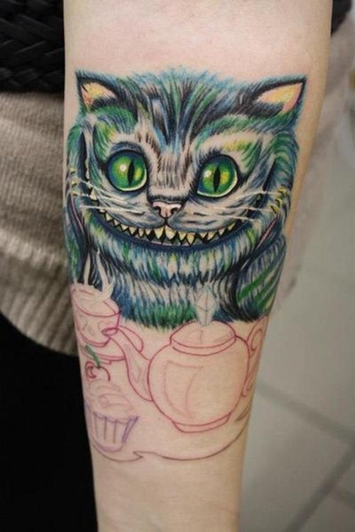 Green Eyes Cat Tattoo On Forearm