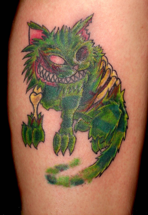 Green Zombie Cat Tattoo On Leg