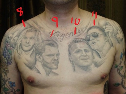 Grey Ink Four Wrestlers Portrait Tattoo On Man Chest.