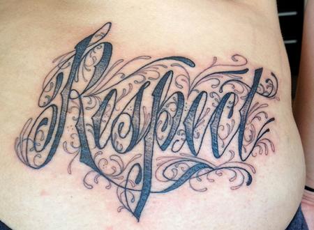 Grey Ink Respect Tattoo On Man Lower Back