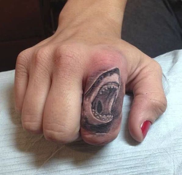 Grey Ink Shakr Tattoo On Girl Finger