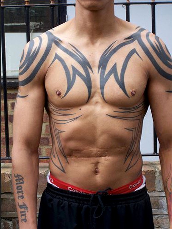 Guy Showing His Full Body Tribal Tattoo