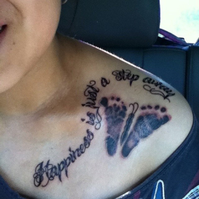 Happiness Is Just A Step Away - Feet Print Tattoo On Left Shoulder