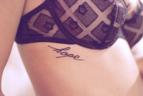 Hope Lettering Tattoo On Under Breast