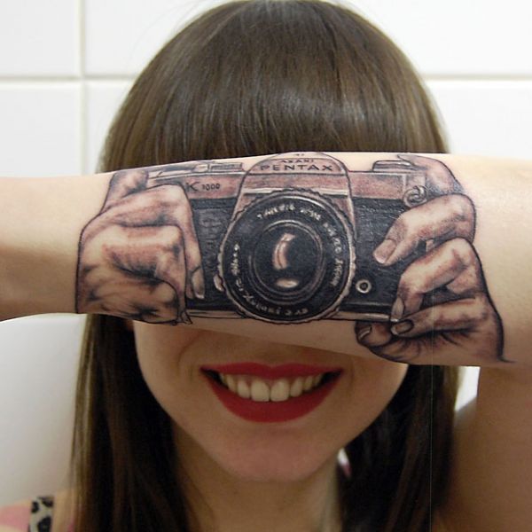 Illusion Movie Camera Tattoo On Girl Forearm