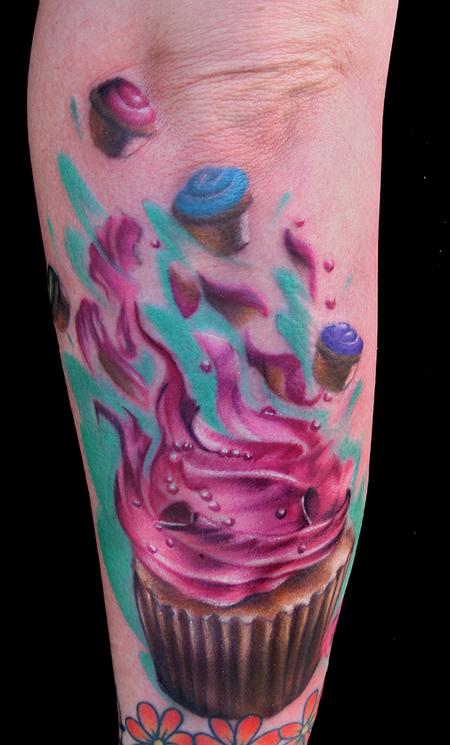 Impressive Colorful Cupcakes Tattoo Design For Arm