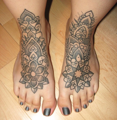 Impressive Flowers Tattoo On Girl Feet
