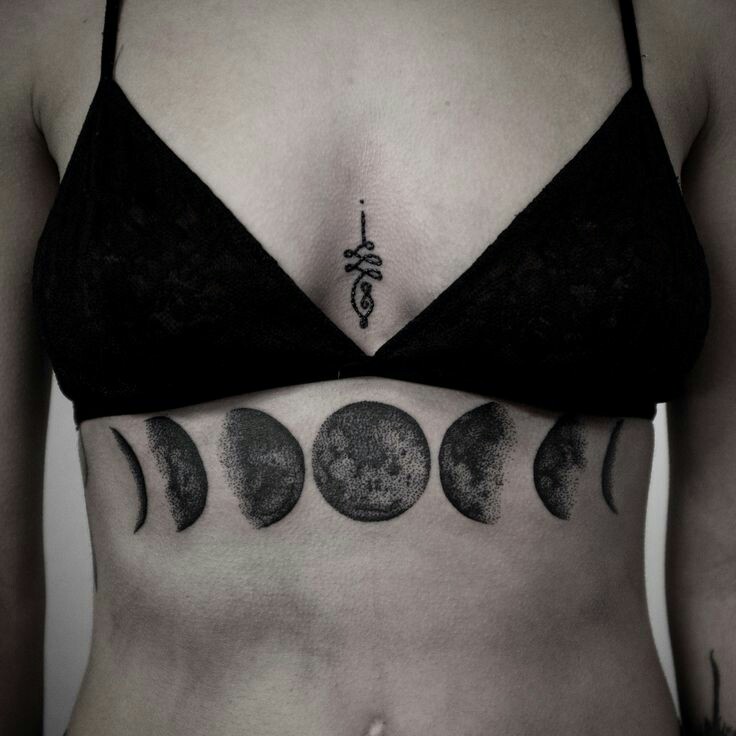 Impressive Moons Tattoo On Under Breast