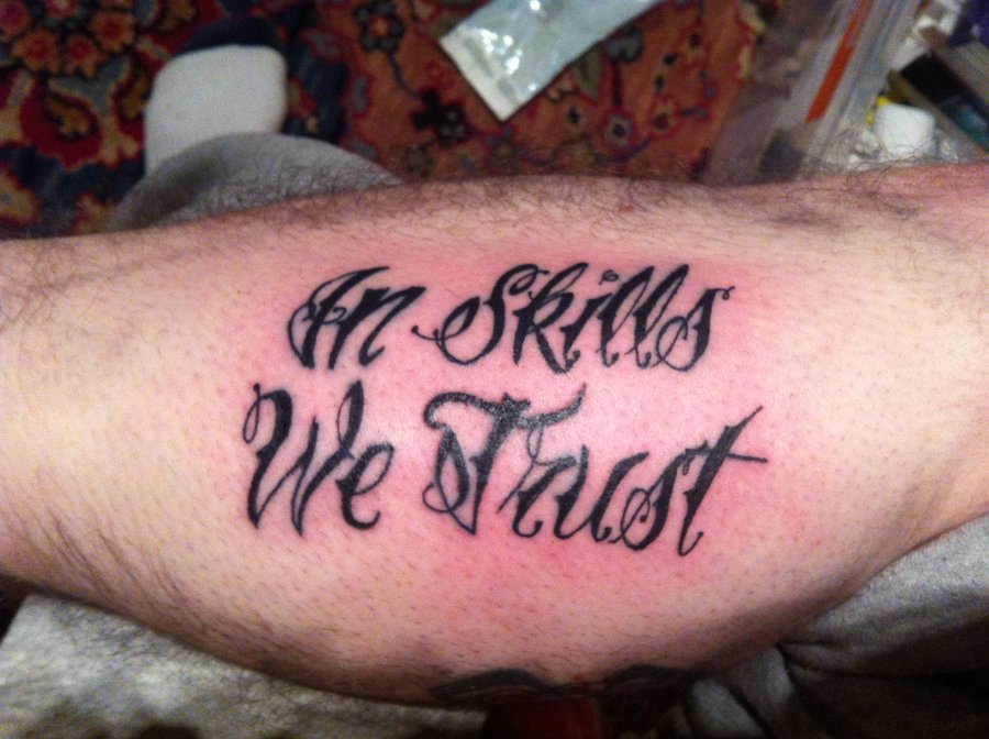 In Skills We Trust Tattoo On Leg