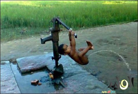 Indian Baby Hanging With Handpump Funny Peeing Picture