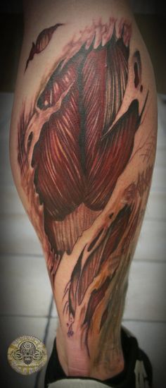 Inspiring Ripped Skin Muscle Tattoo On Leg Calf