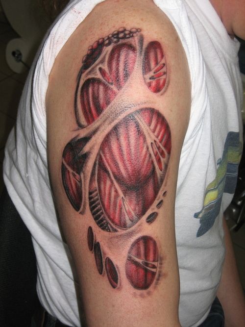 Inspiring Ripped Skin Muscle Tattoo On Right Half Sleeve