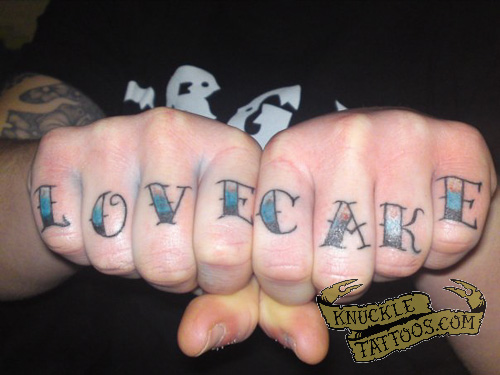 Love Cake Lettering Tattoo On Both Hand Fingers