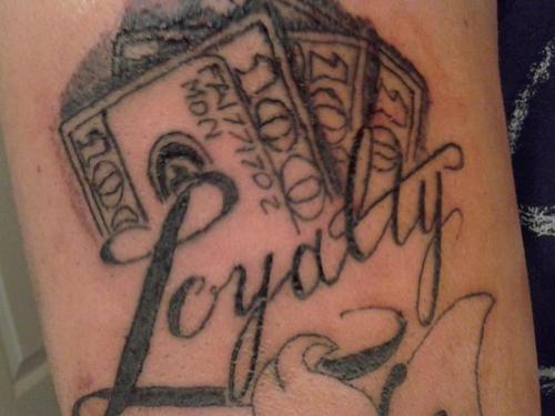 Loyalty Tattoo On Left Bicep