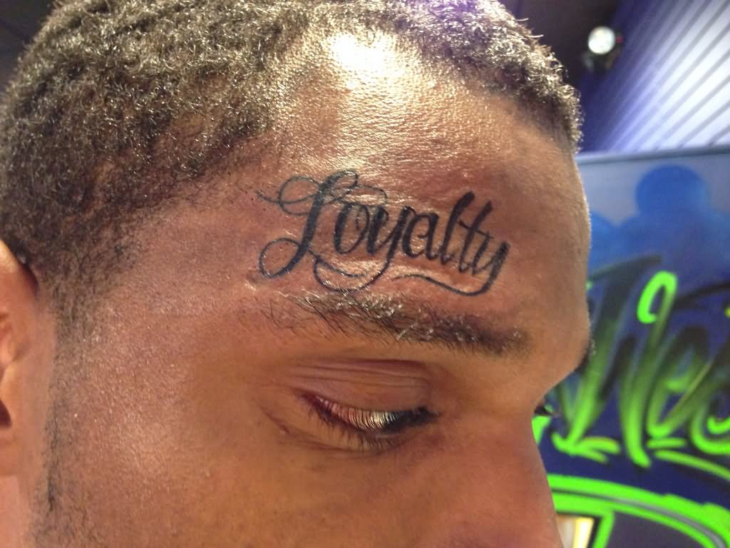 Loyalty Tattoo On Man Forehead