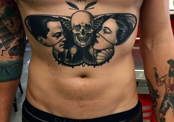 Man And Women Face In Butterfly Wings With Skull Tattoo On Under Breast