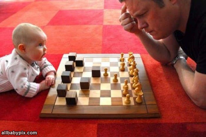 Man Playing Chess With Little Baby Funny Picture
