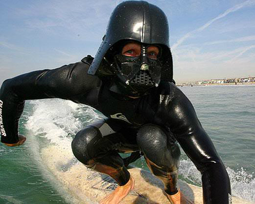 Man Wearing Darth Vader Costume Funny Surfing Image