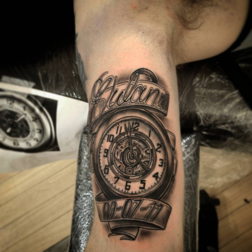 Memorial Black Ink Pocket Watch With Banner Tattoo Design For Bicep