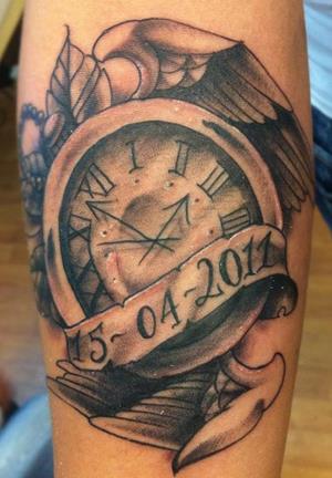 Memorial Pocket Watch With Wings And Banner Tattoo Design