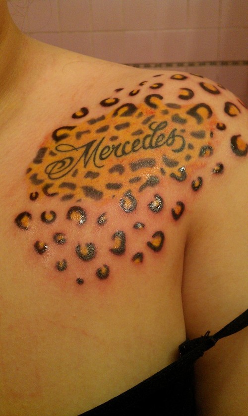 Mercedes Cheetah Print Tattoo On Girl Left Shoulder