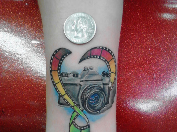 Movie Camera With Colorful Reel Tattoo Design