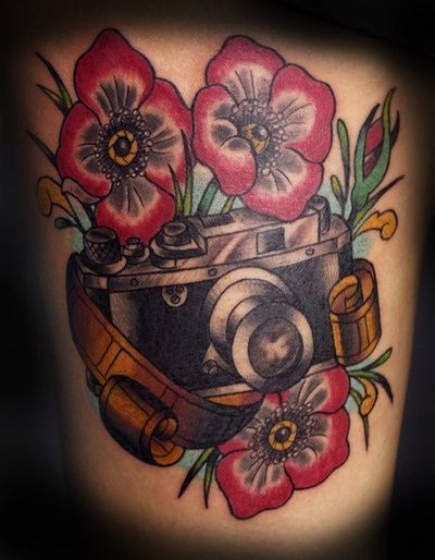 Movie Camera With Flowers Tattoo Design