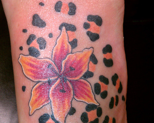 Nice Flower And Cheetah Tattoo Idea