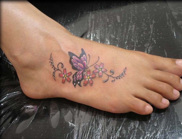 Nice Flowers With Butterfly Tattoo On Foot