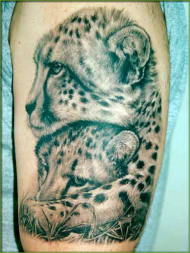 Nice Grey Cheetah Tattoo On Half Sleeve