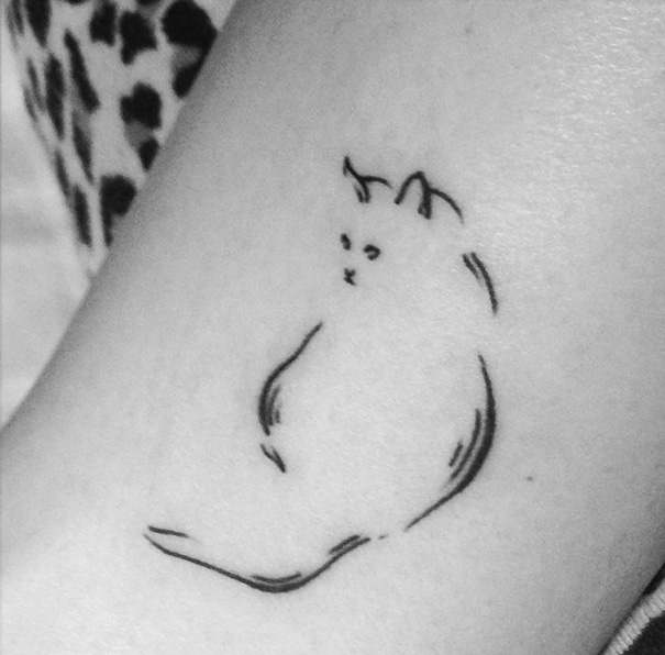 Nice Outline Cat Tattoo On Bicep