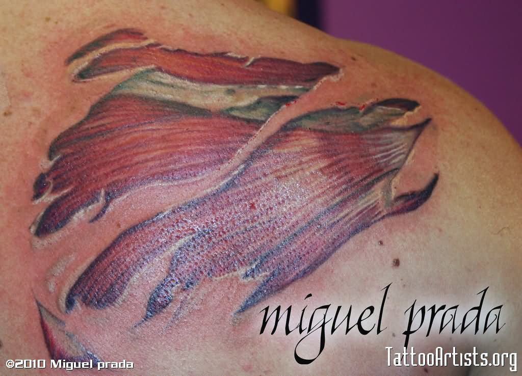 Nice Ripped Skin Muscle Tattoo On Right Back Shoulder
